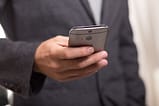 holding phone