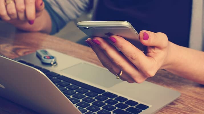 woman holding phone