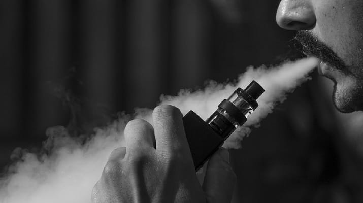 Guy using vape